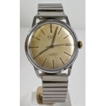 A vintage Avia Cadet men's automatic wristwatch with stainless steel case and expanding strap. Cream