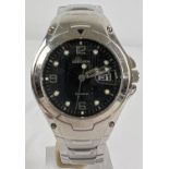A men's Sekonda stainless steel cased and strap wristwatch. Black face with luminous detail hands