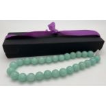 A boxed 18 inch Amazonite quartz large round bead necklace with white metal magnetic clasp. In as