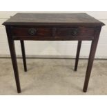 A vintage dark oak 2 drawer hall/console table with brass hooped handles and straight legs.