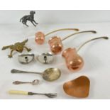 A box of assorted vintage metal items to include antique pewter novelty pepperette in the form of