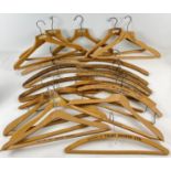 22 vintage wooden advertising coat hangers for tailors, hotels and cleaners. To include: William