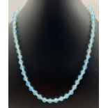 A blue lustre Austrian crystal 18" beaded necklace with magnetic barrel clasp. Retired jewellery