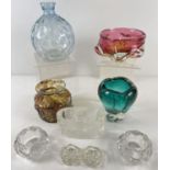 A collection of assorted clear and coloured glass items. To include 2 heavy studio glass ashtrays/
