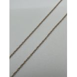 A fine 18 inch 9ct gold rope chain with spring clasp. Clasp stamped 375. Total weight approx. 0.6g.