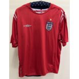 An England FC 2004/06 away football shirt. Size XL. With Eros and number 10 printed to the back.