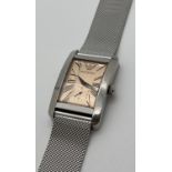 A men's AR-0154 wristwatch with stainless steel mess style strap by Emporio Armani. Square shaped