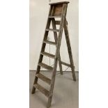 A vintage wooden step ladder. Approx. 179cm tall.