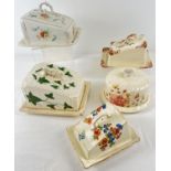 A collection of 5 assorted vintage ceramic lidded butter/cheese dishes. In varying conditions, sizes
