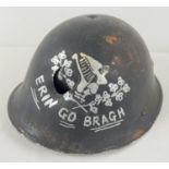 A British MkIV steel helmet shell with painted Eirin Go Bragh (Ireland Forever) slogan. Believed