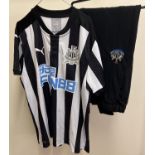 A Newcastle United FC 2017/18 season, 125 year anniversary football shirt. Size XL. Together with