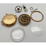 An antique 18ct gold pocket watch case with watch parts. Case has engraved initials BH to back. Worn