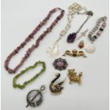 A collection of assorted vintage costume jewellery to include natural stone set items. Lot includes: