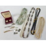 A collection of assorted vintage costume jewellery items. To include: natural stone and glass bead