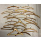 20 vintage wooden advertising coat hangers for hotels, tailors and cleaners. To include Goddard's of