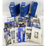 A boxed collection of 100+ Everton FC football programs of various dates from the 1990s onwards.