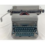 A vintage 1950's Remington typewriter.