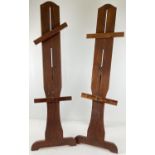2 wooden easel style display stands with folding foot/stand. With height adjustable supports. Each