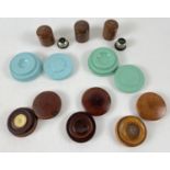 A collection of 8 vintage treen and Bakelite watchmakers oil pots and "lupe" pots. 2 lupe pots