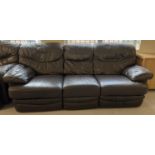 A large modern brown leather 3 seater settee with reclining end seats (lever activated).