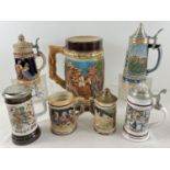 A very large ornamental ceramic stein together with 6 other smaller assorted steins. Largest approx.