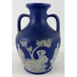 A 19th century Wedgwood Portland blue Jasperware dipped 2 handled vase. Approx. 21cm tall. Stamped