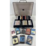 A vintage Warwick music cassette carry case containing 34 music cassettes. Artists include: The