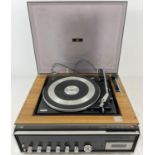 A 1970's National Panasonic SG 2050L record turntable with integral radio cassette.