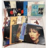A collection of 23 vintage Rock, Pop and easy listening LP records and 3 7" singles. Artists