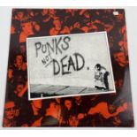 "The Exploited - Punks Not Dead" Vinyl Record. SEC 1, PRS Pressing. Published by Secret Records,