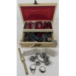 A vintage cream jewellery box containing assorted vintage and modern costume jewellery. To include