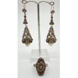 A pair of vintage white metal, floral design, drop style earrings, together with a similar dress