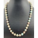 An 18" Imperial jasper beaded necklace with alternating irridescent beads. With silver tone magnetic