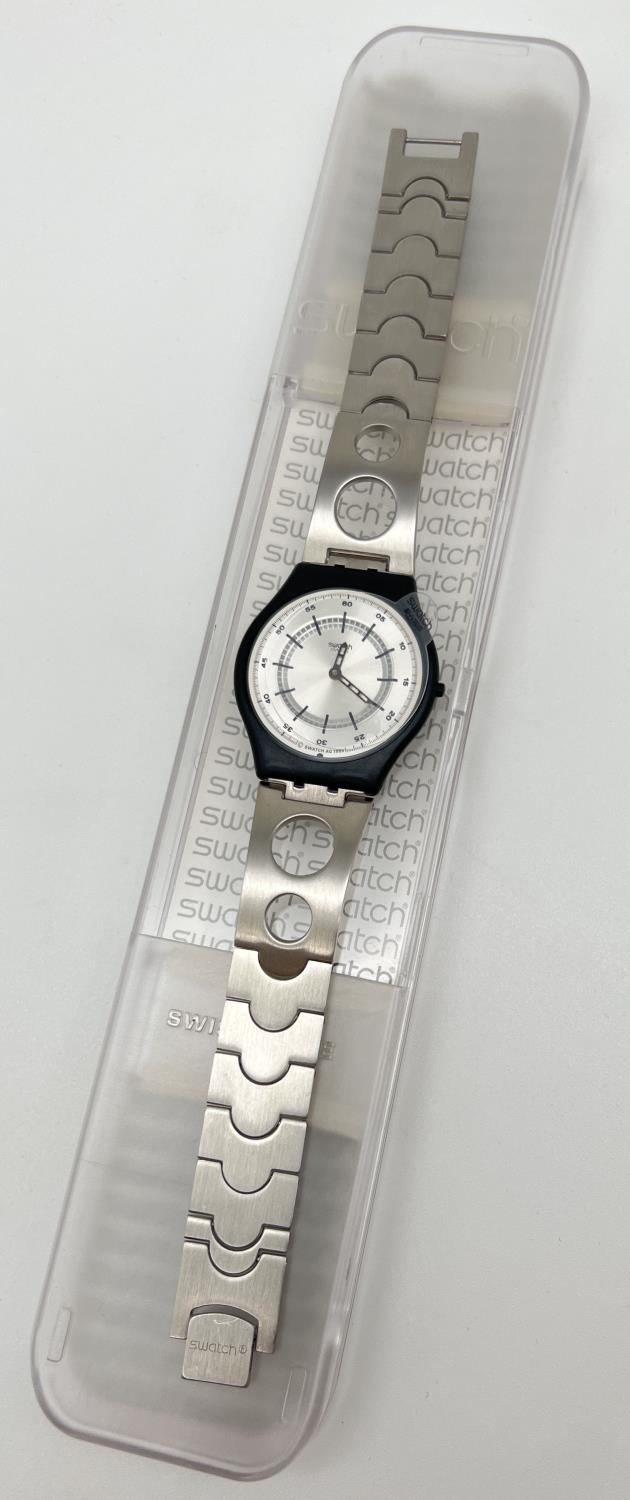 An AG 1999 Swatch watch with black plastic case and stainless steel strap. With original box and - Image 3 of 3