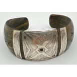 A horn ethnic style cuff bangle with white metal engraved panels and inlay decoration.