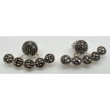 A pair of modern design silver convertible earrings set with marcasite stones, by The Genuine Gem