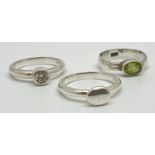 3 modern design silver dress rings - can be worn individually or as a stack. One set with an oval