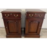 A pair of vintage mahogany bedside cabinets with brass drop handles and escutcheons. Single drawer