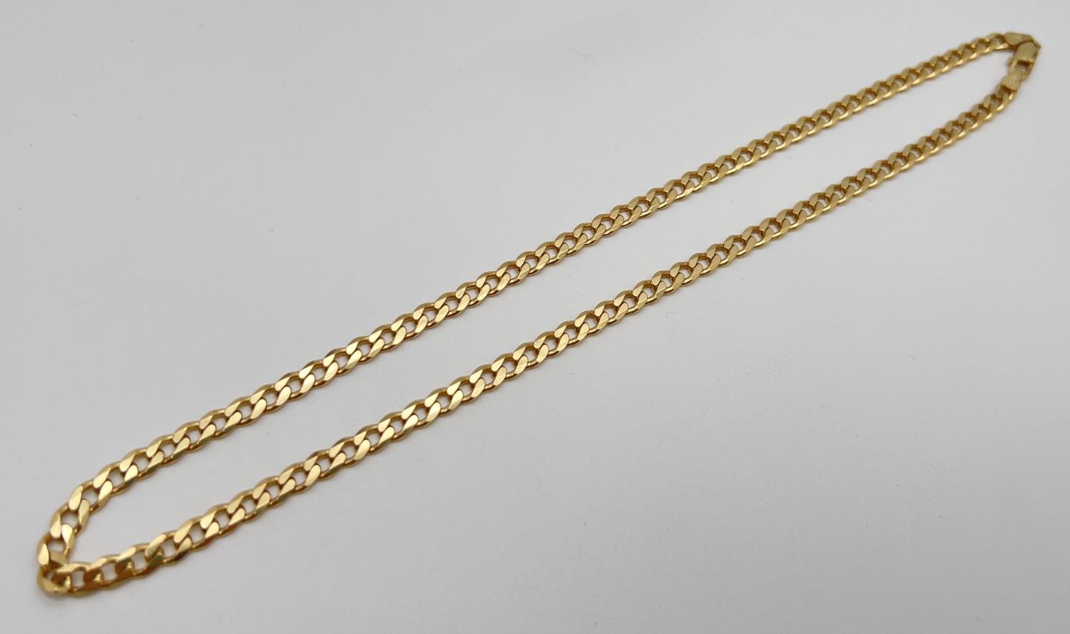 A 20 inch silver gilt heavy curb chain necklace with lobster style clasp. Silver marks to clasp - Image 2 of 2