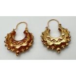 A pair of 9ct gold creole style earrings for pierced ears. Full hallmarks to each post. Approx. 3.