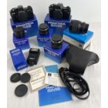2 x Praktica BMS electronic cameras in original boxes together with a collection of lenses and