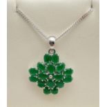 A boxed Shipton & Co. large 925 silver modern design pendant set with 16 oval cut green stones. On