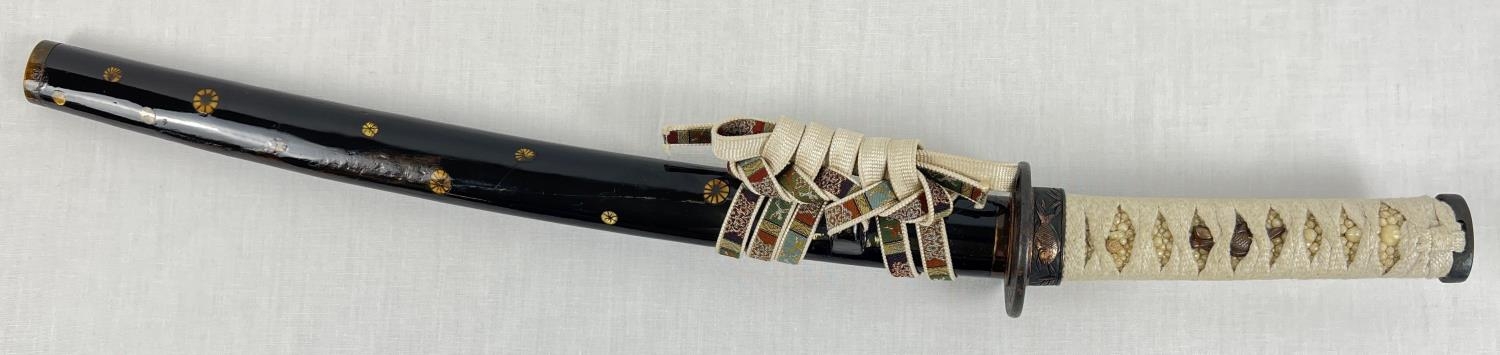 A Muromachi Japanese Wakizashi sword with : urushi black saya/scabbard with seashell motifs.