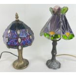 2 metal based Tiffany style table lamps with coloured glass leaded shades. A lamp with hexagonal