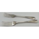 A pair of Regency silver George III dessert forks with Old English pattern handles. Hallmarked for