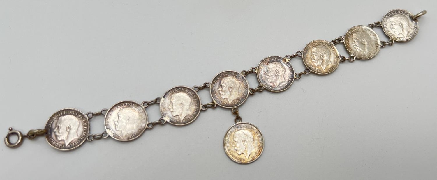 A vintage silver bracelet made from George V silver three pence coins, all dated 1911, 1915 and