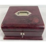 A Victorian red leather lockable travelling jewellery/keepsake box. With burgundy silk lined