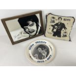 3 items of Elvis Presley memorabilia. A framed "Loving You Elvis" mirror, a padded and fringed small