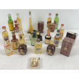 25 vintage alcohol miniature bottles, mostly whiskey, to include novelty bottles. Examples