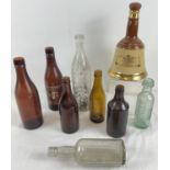 A small collection of vintage ceramic and glass bottles to include: Bells Whisky; Adnams, Southwold;